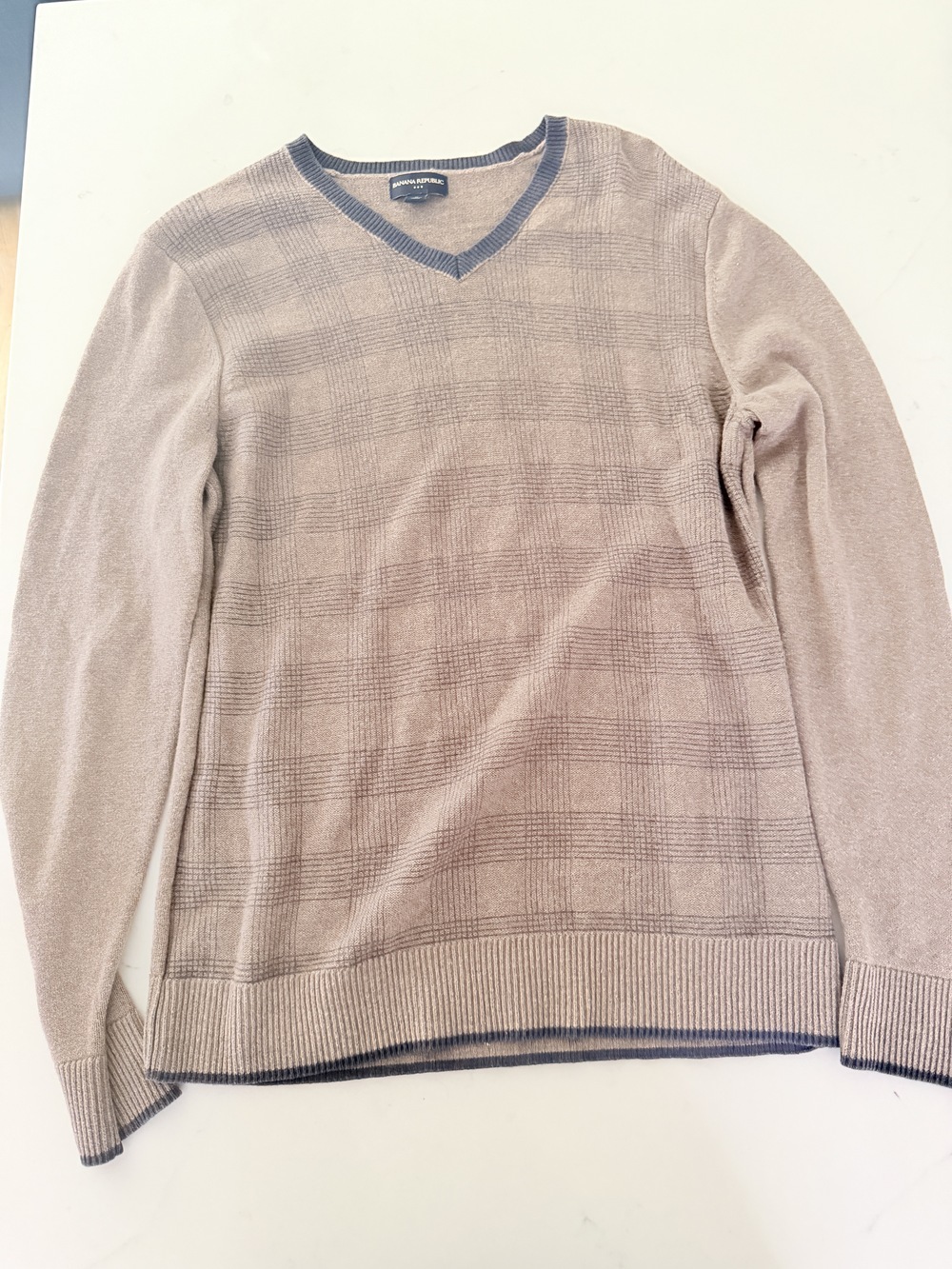 Brown checkerboard two-toned v-neck sweater